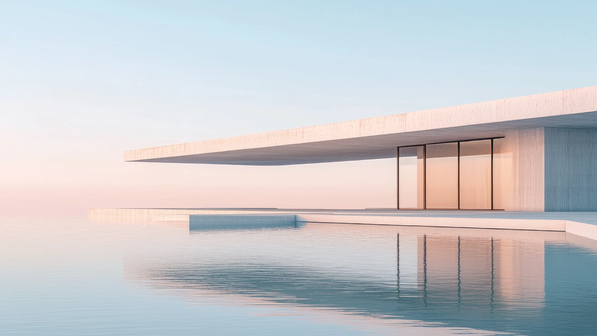 Maison moderne minimaliste avec terrasse et piscine face à la mer
