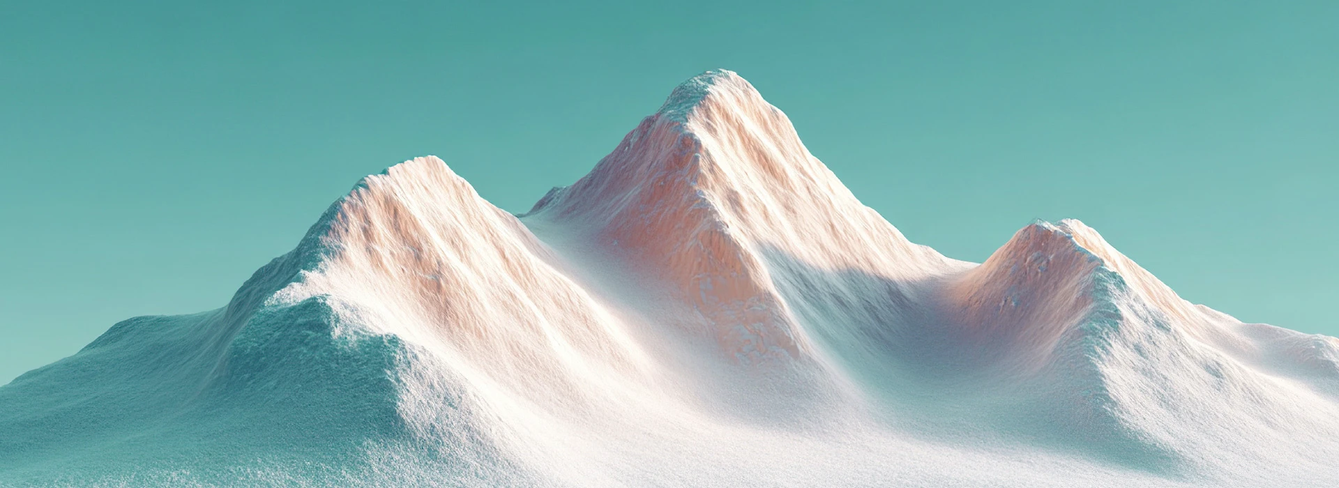 Chaîne de montagnes enneigées sous un ciel bleu clair
