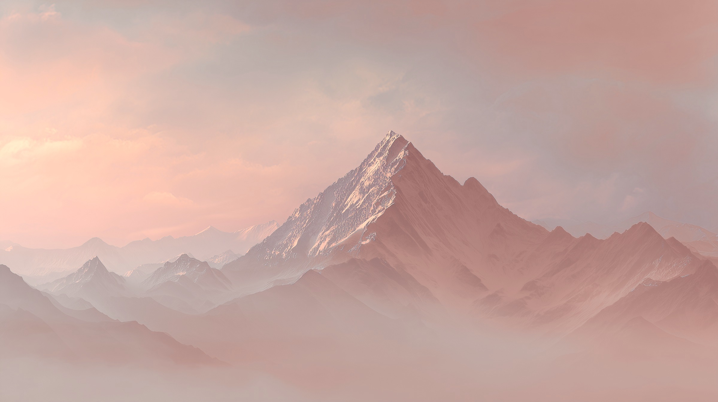 Pic montagneux rose émergeant de la brume